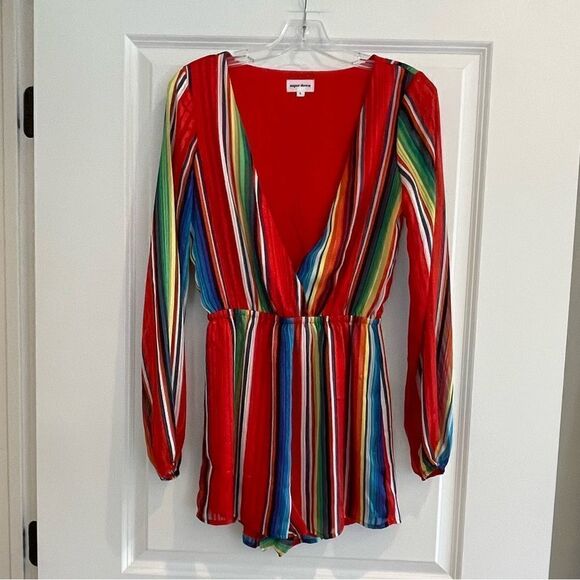 EUC Rio Surplice Romper Color: Rainbow Stripe
Never worn. Sz. S - Picture 3 of 8